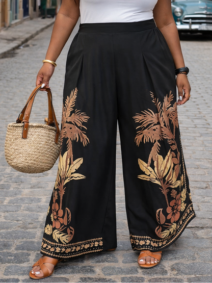 Woman in black pants with floral patterns and a white top standing on a street.