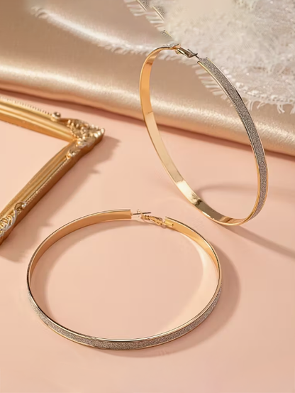Exaggerated Hoops in Gold and Silver
