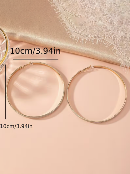 Exaggerated Hoops in Gold and Silver